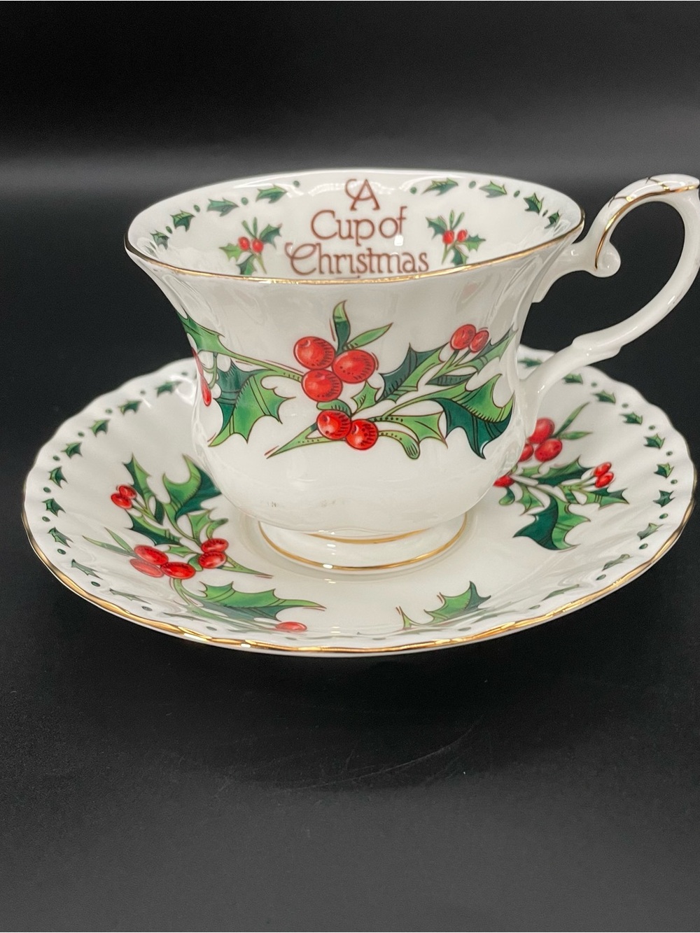A Cup of Christmas Tea Warren Hanson Waldman House Bone China Cup & Saucer Set